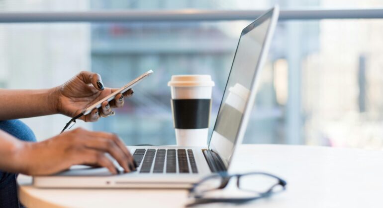 Free laptop on table top stock photo