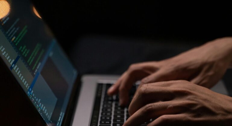 person-using-silver-and-black-laptop-computer