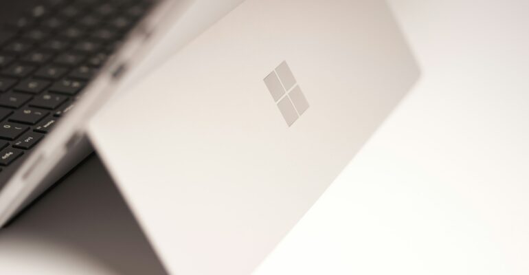 white-laptop-computer-on-white-table