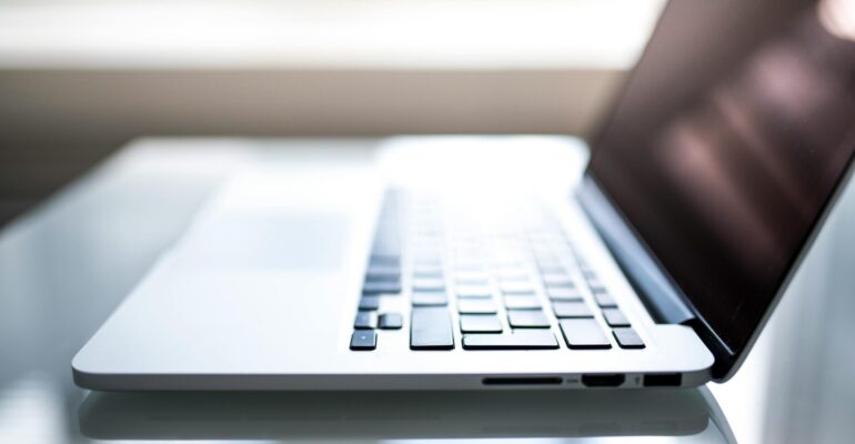 shallow-focus-photography-of-macbook