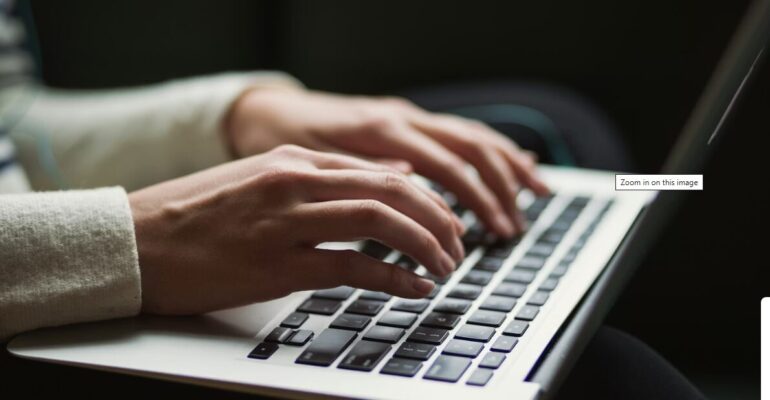 Person using laptop photo